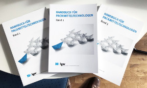 aufgefächert nebeneinander die Cover der Bände 1-3 des 'Handbuchs für Packmitteltechnologien'